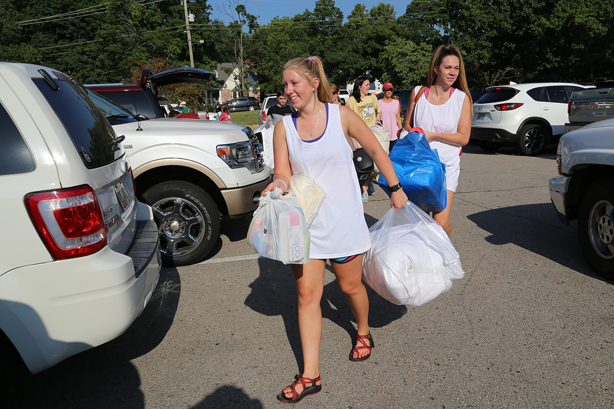 Gamma Chi volunteers move a student’s belongings out of Lot 41.
