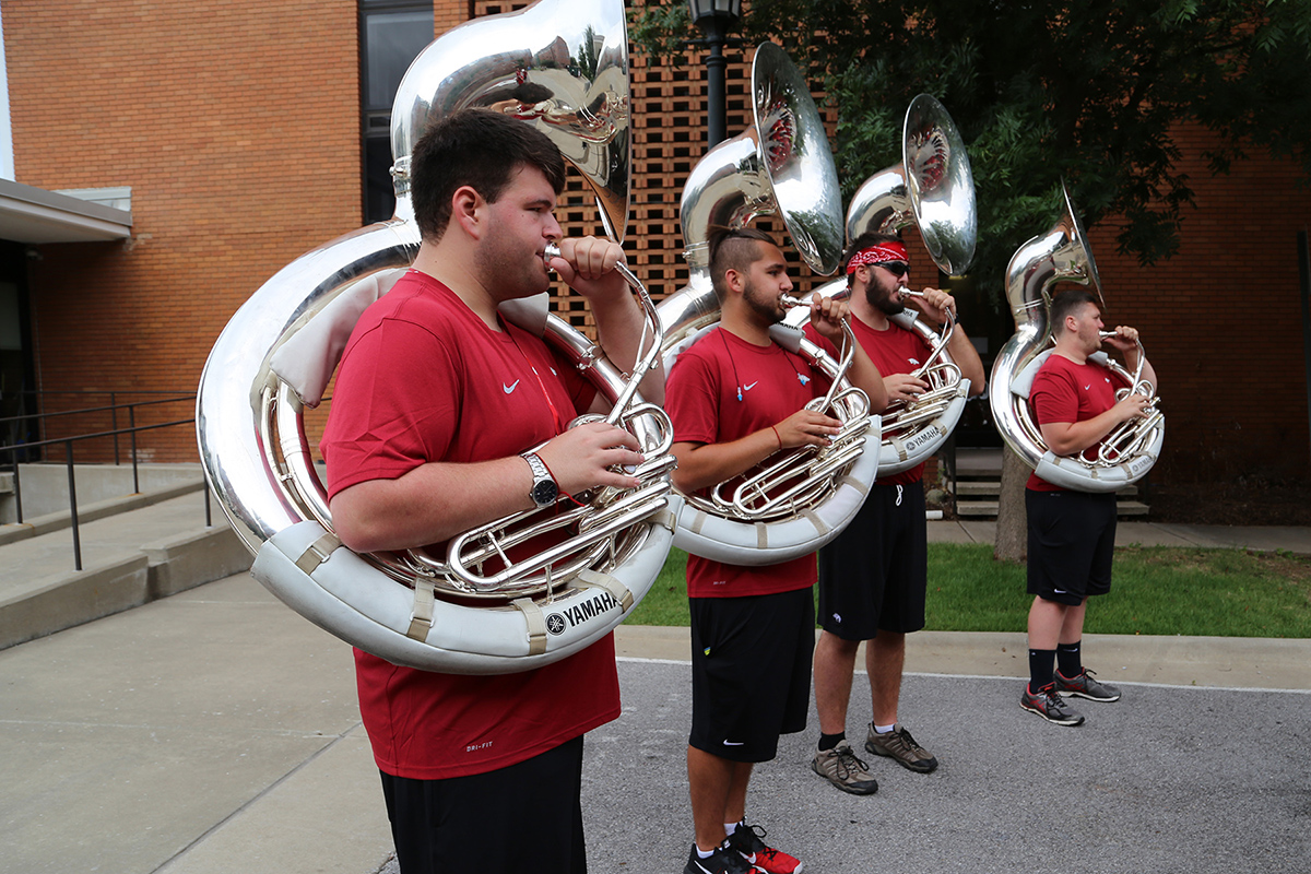 The sousaphones participate in the traditional Marching Band Move-in Welcome.
